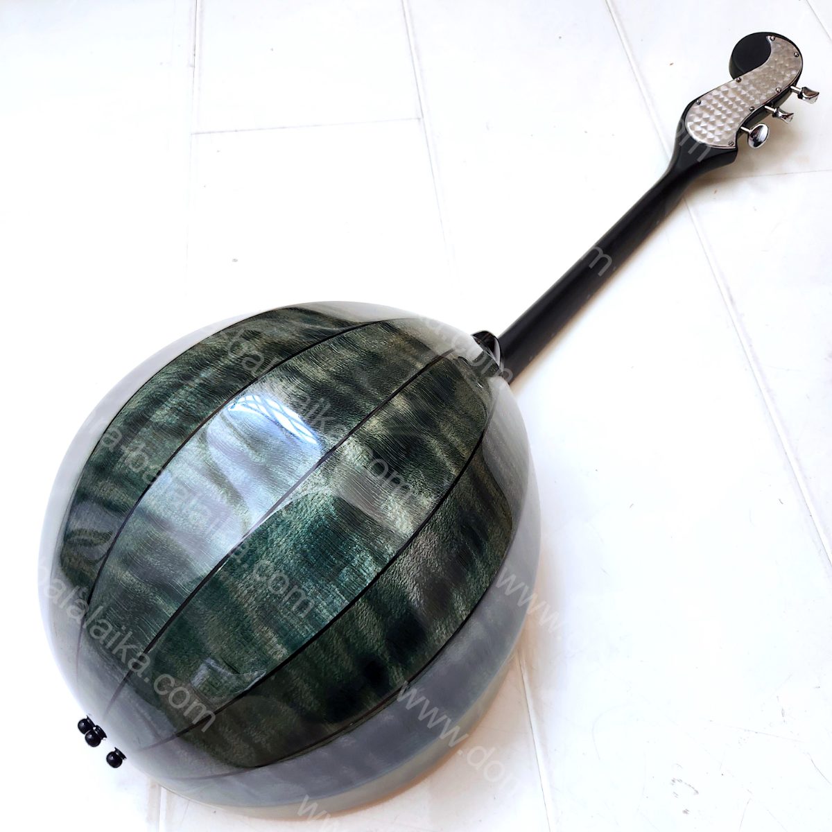 A student Russian Pro domra with an ebony neck and fingerboard, and a body in a..., photo 9
