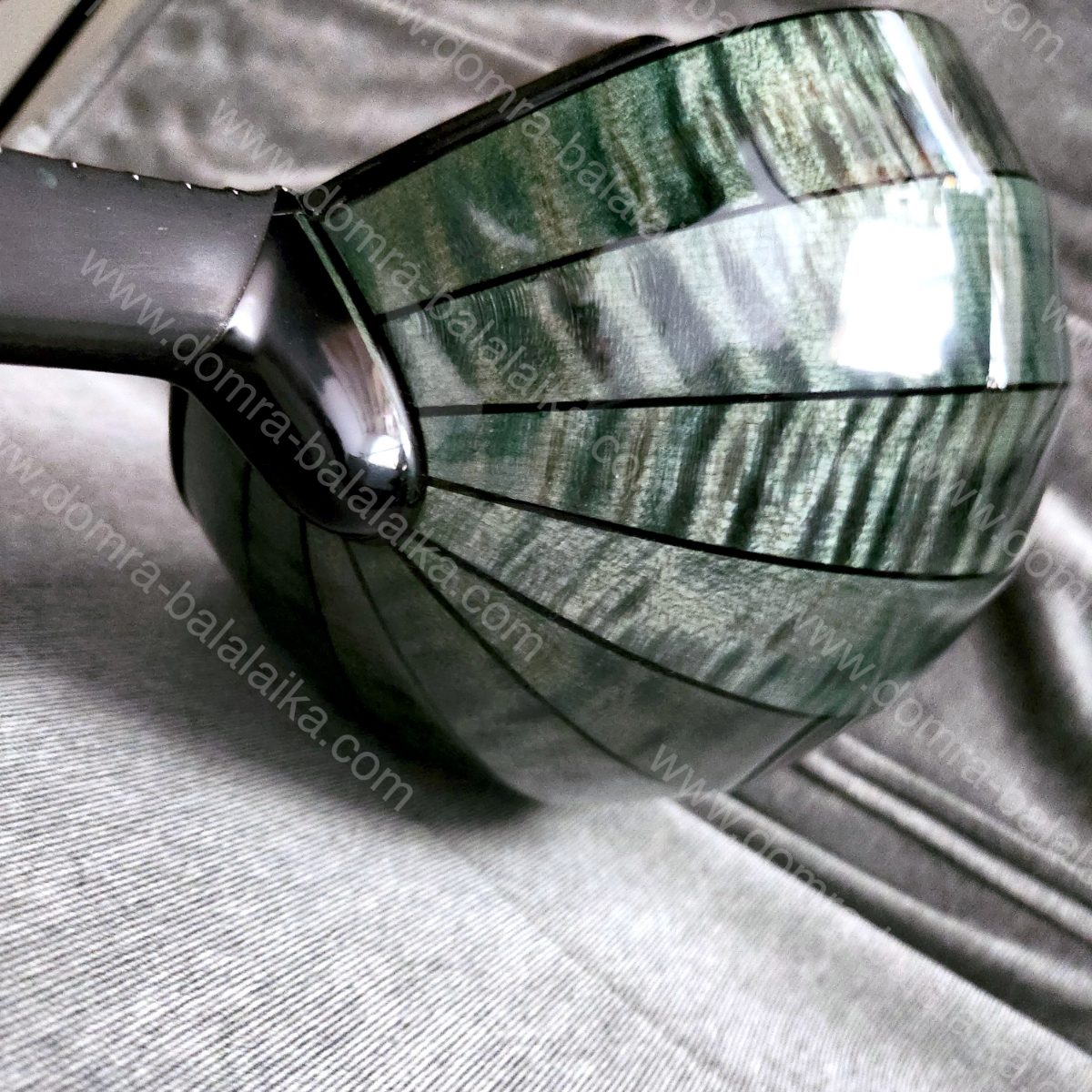 A student Russian Pro domra with an ebony neck and fingerboard, and a body in a..., photo 7
