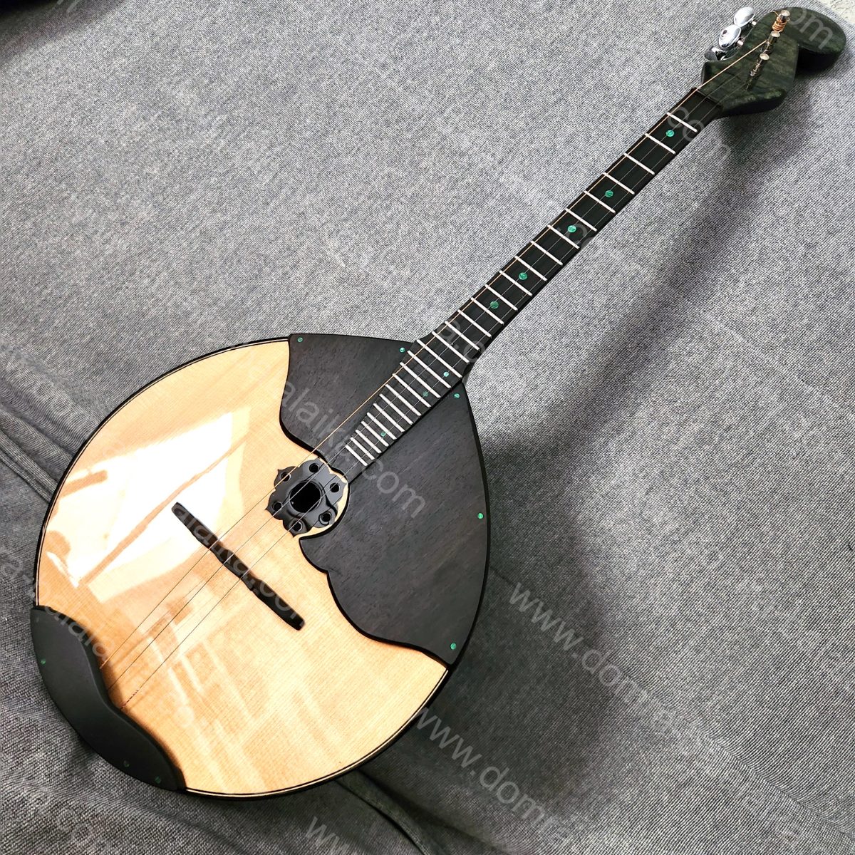 A student Russian Pro domra with an ebony neck and fingerboard, and a body in a..., photo 4