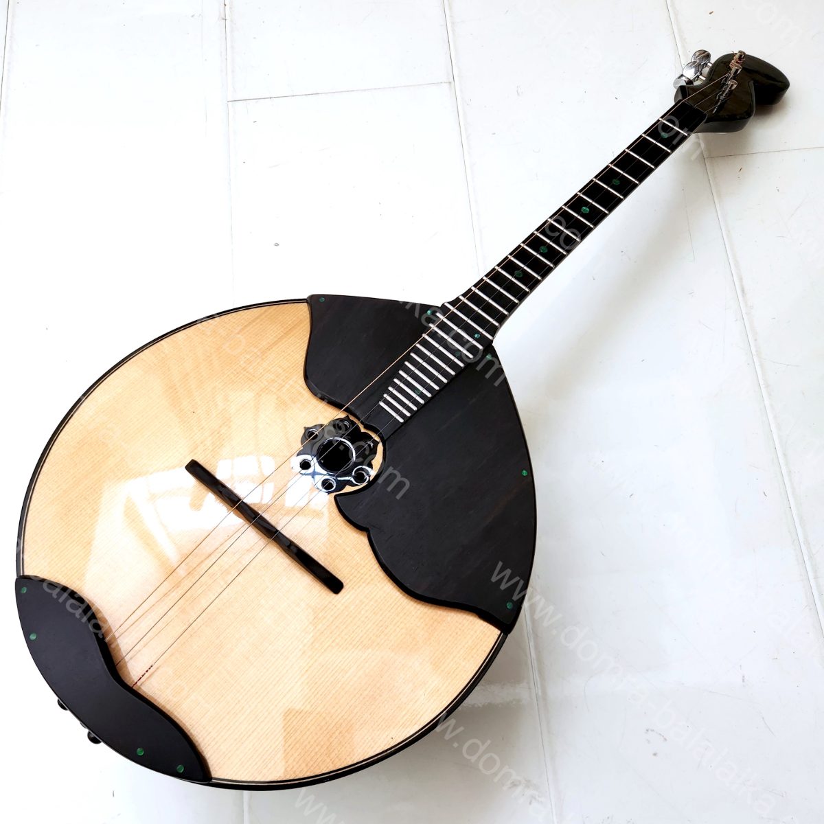 A student Russian Pro domra with an ebony neck and fingerboard, and a body in a..., photo 10