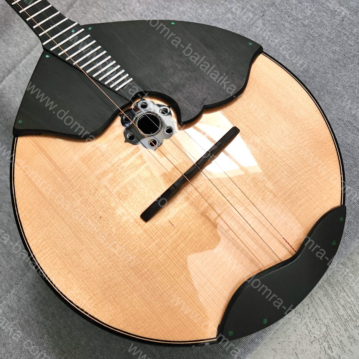 A student Russian Pro domra with an ebony neck and fingerboard, and a body in a..., photo 1