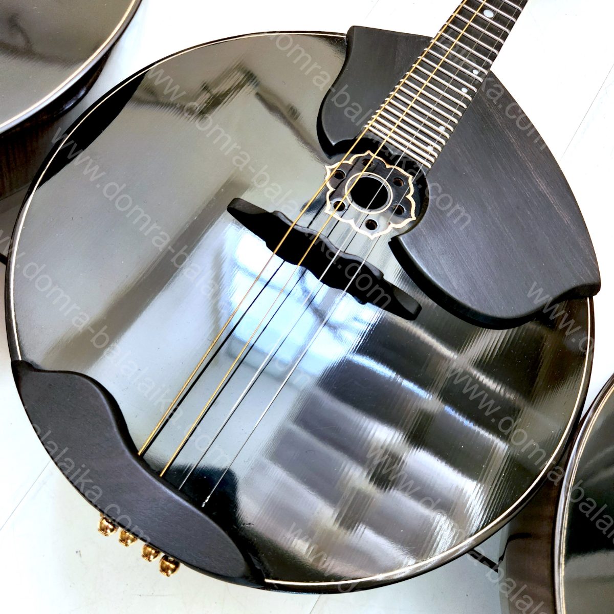 From left to right in the photo: a black top-grade concert alto domra, a black..., photo 9
