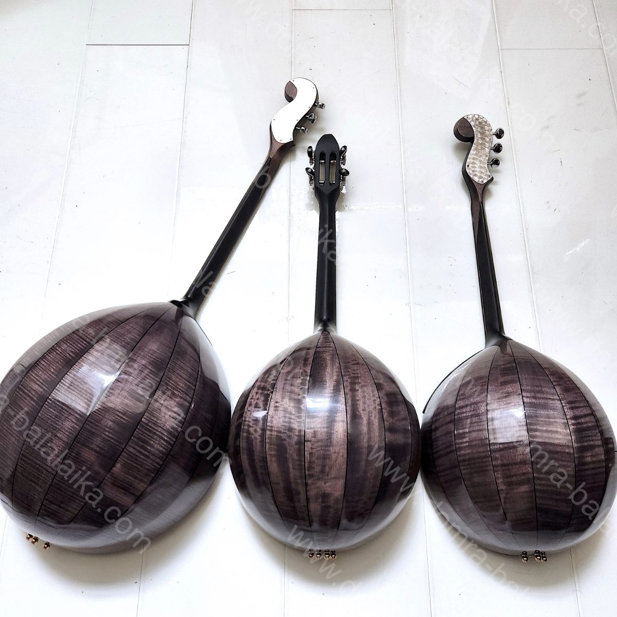 From left to right in the photo: a black top-grade concert alto domra, a black..., photo 6