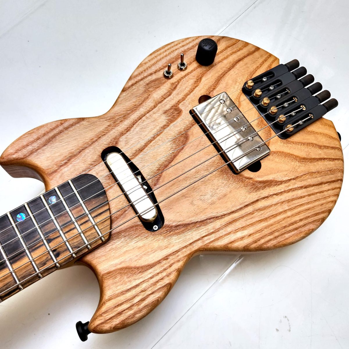 Body — figured ash; neck — roasted maple; fingerboard — lunar ebony; two custom..., photo 1