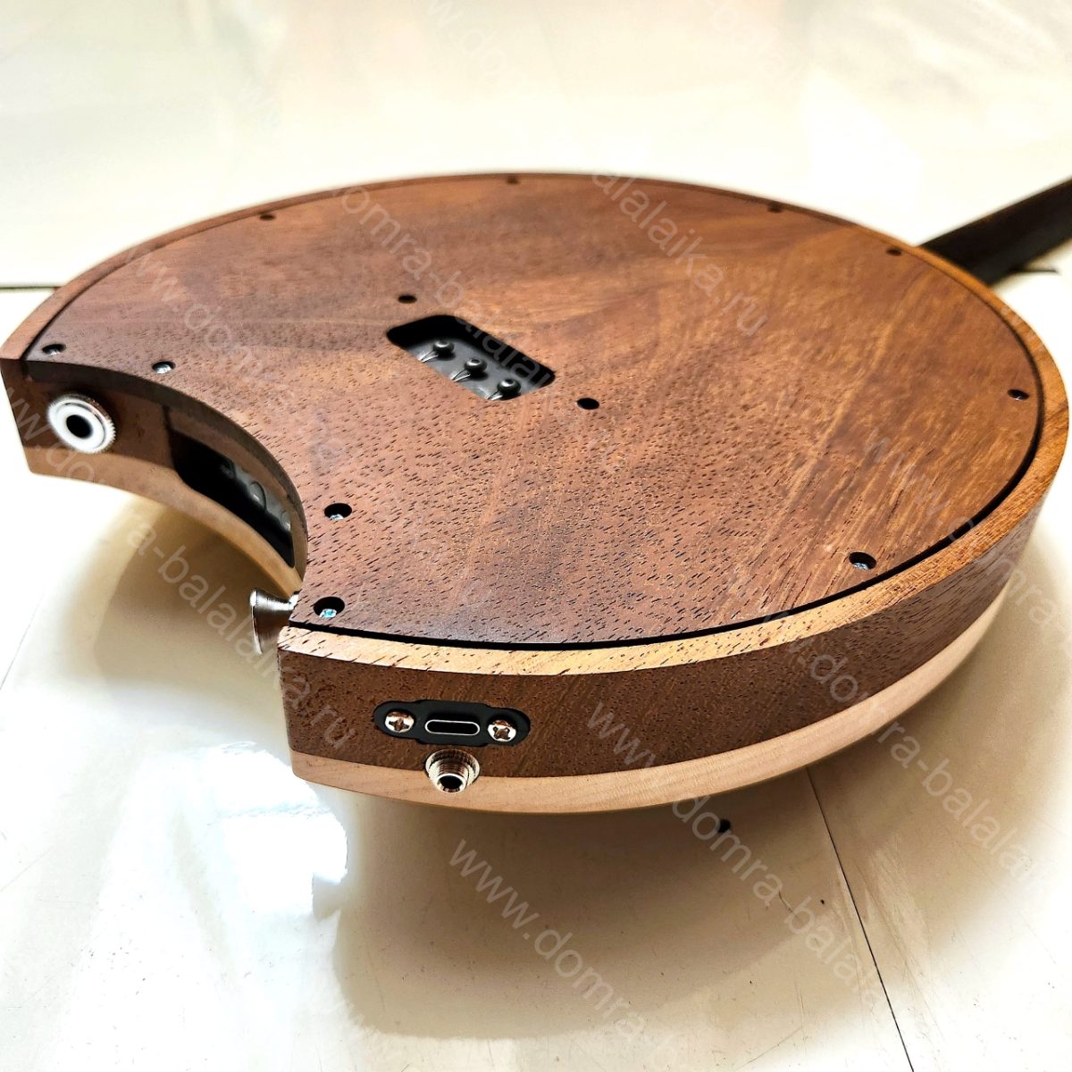 Free three‑string electric domras are hard to come by — we don’t get them often..., photo 6
