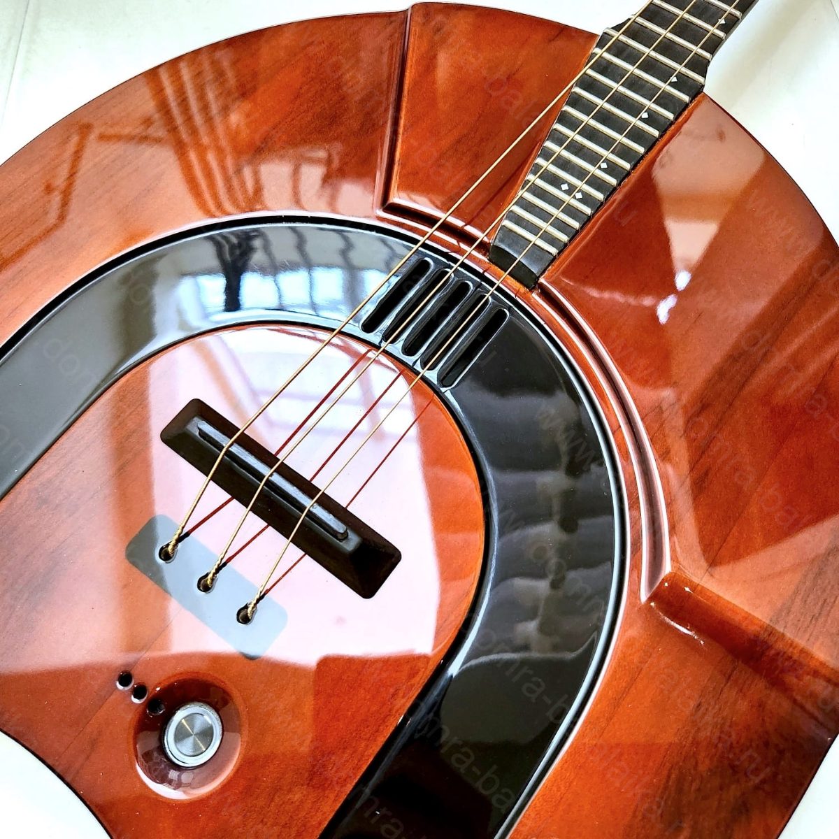 The photo shows an electric alto domra in a “natural” violin‑brown colour. In r..., photo 4