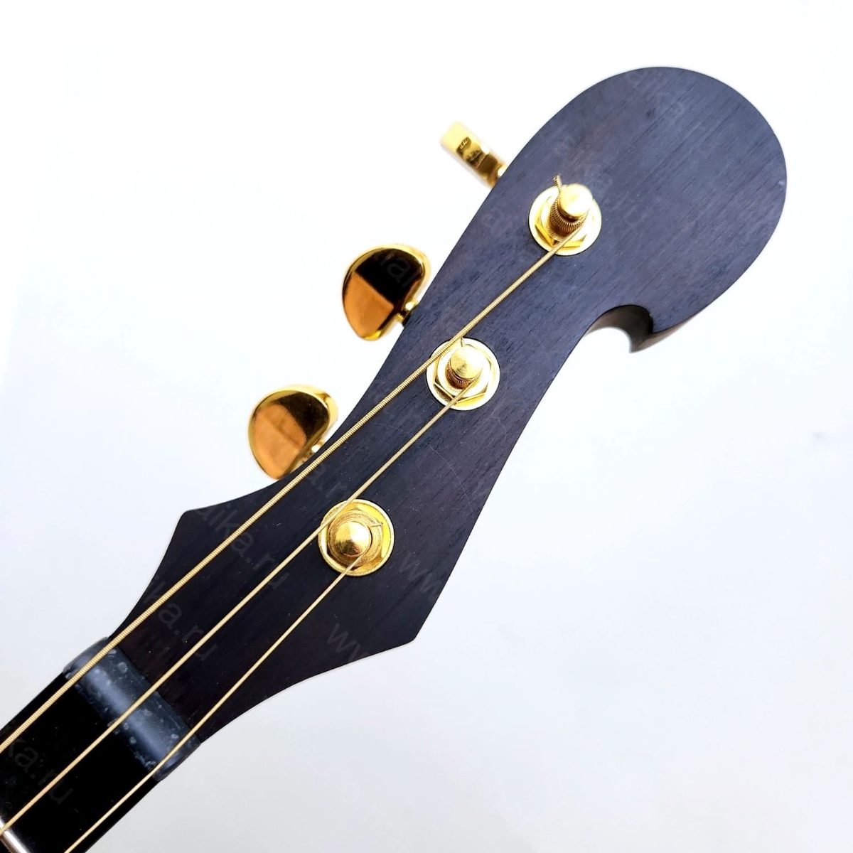 The photo shows an electric alto domra in a “natural” violin‑brown colour. In r..., photo 3