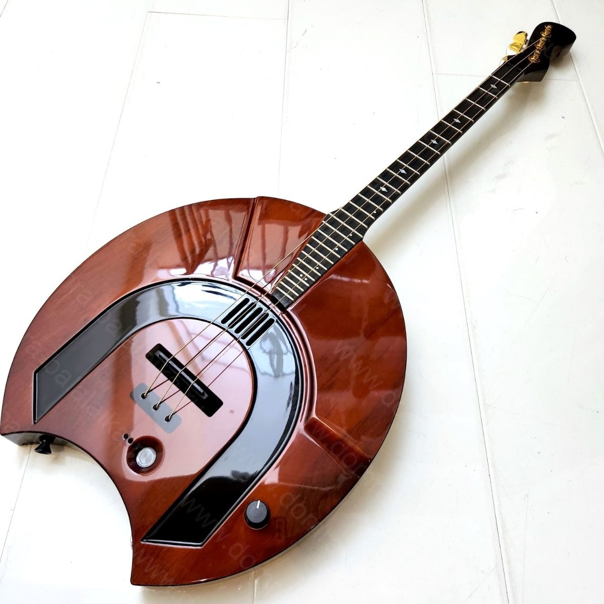 The photo shows an electric alto domra in a “natural” violin‑brown colour. In r..., photo 1