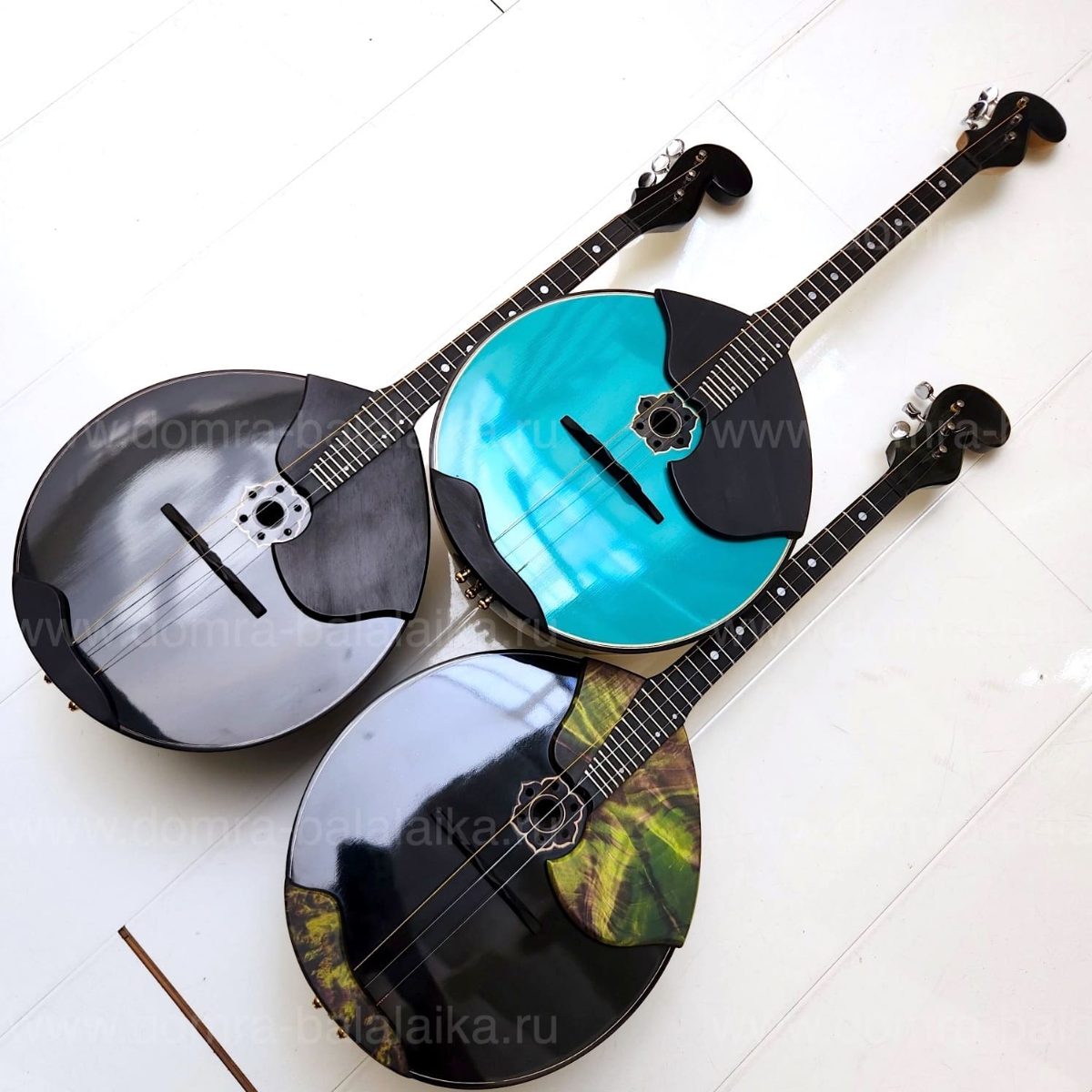 The photo shows three luxury concert‑grade domras of the highest category: “Bla..., photo 5