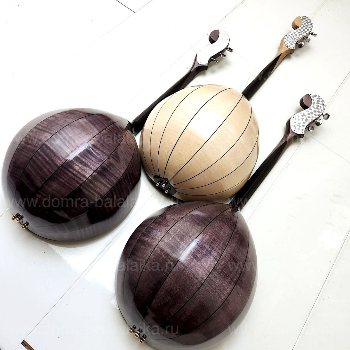 The photo shows three luxury concert‑grade domras of the highest category: “Bla..., photo 4