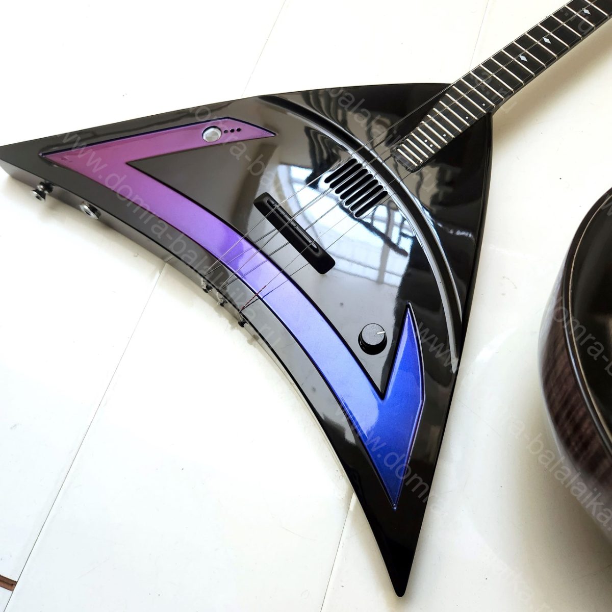 A concert domra lux with a black‑wood fingerboard and steel frets, as well as a..., photo 5