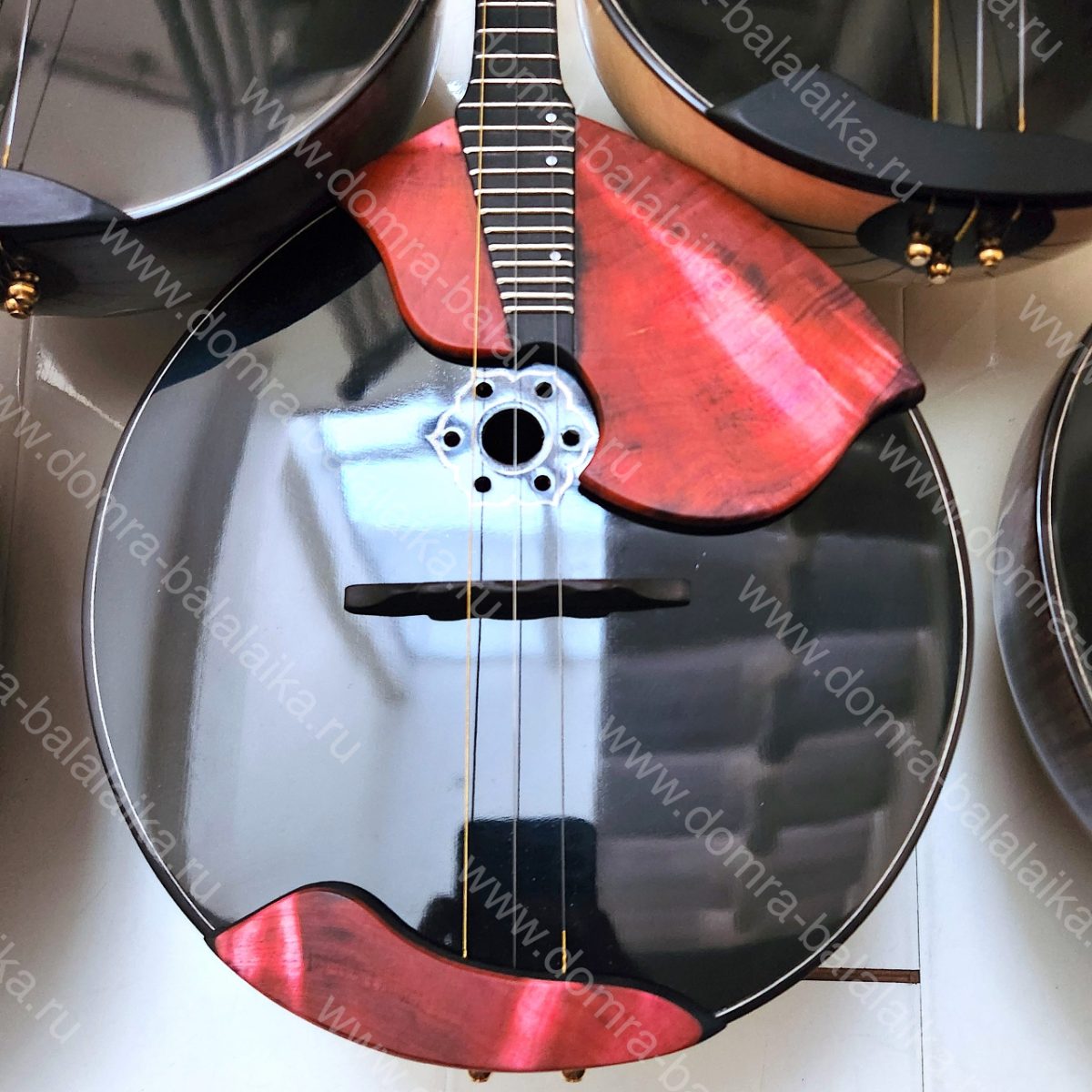 All instruments feature ebony fingerboards and fingerboard overlays, enlarged‑v..., photo 2