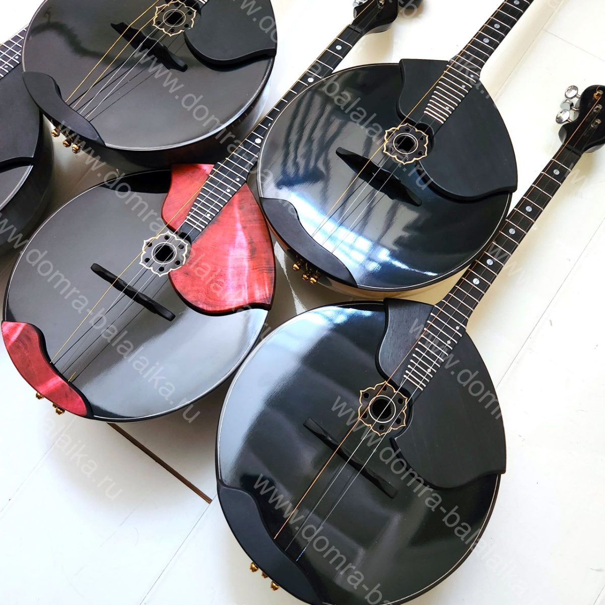 All instruments feature ebony fingerboards and fingerboard overlays, enlarged‑v..., photo 5