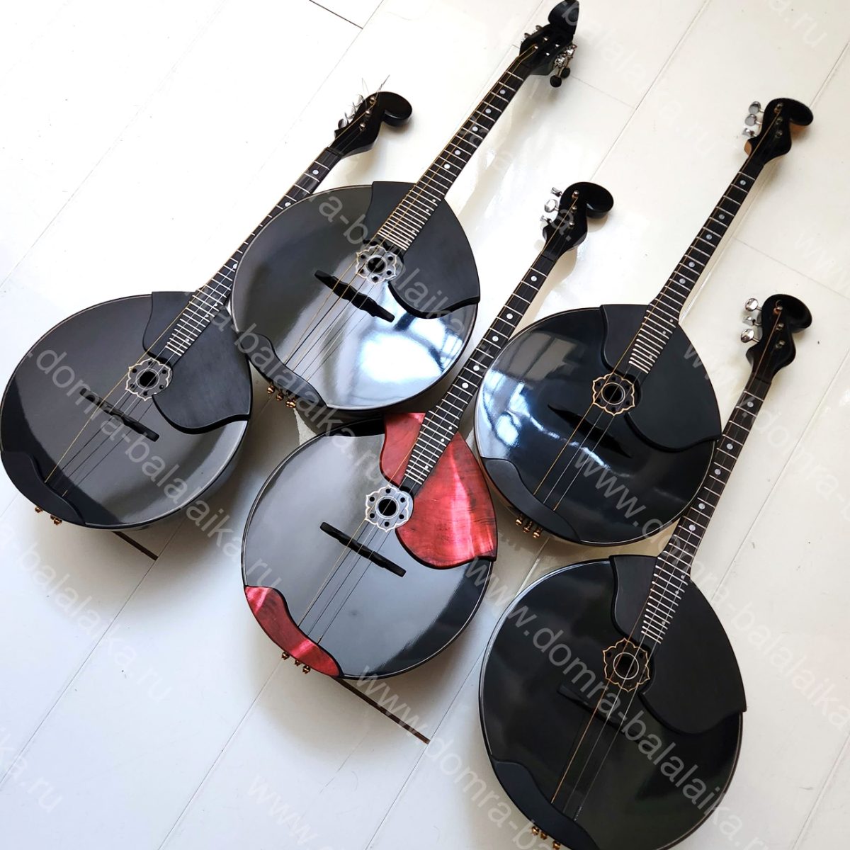 All instruments feature ebony fingerboards and fingerboard overlays, enlarged‑v..., photo 7