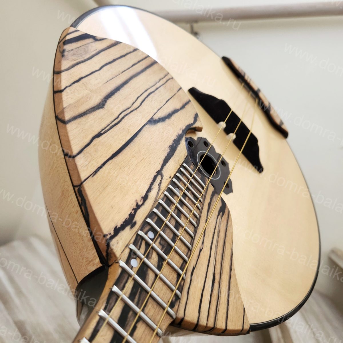 A concert alto domra with a fingerboard made of ebony. It has a deep, beautiful..., photo 1
