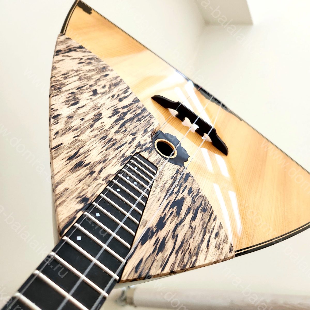 The body is made of figured maple, toned to a dark colour; the soundboard is re..., photo 5