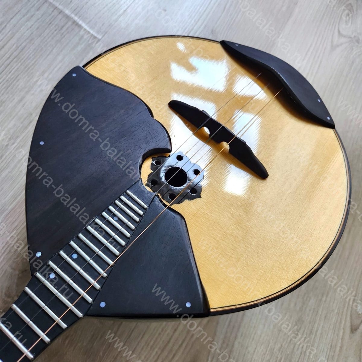One of our young and talented luthiers proposed creating a student‑level pro do..., photo 2