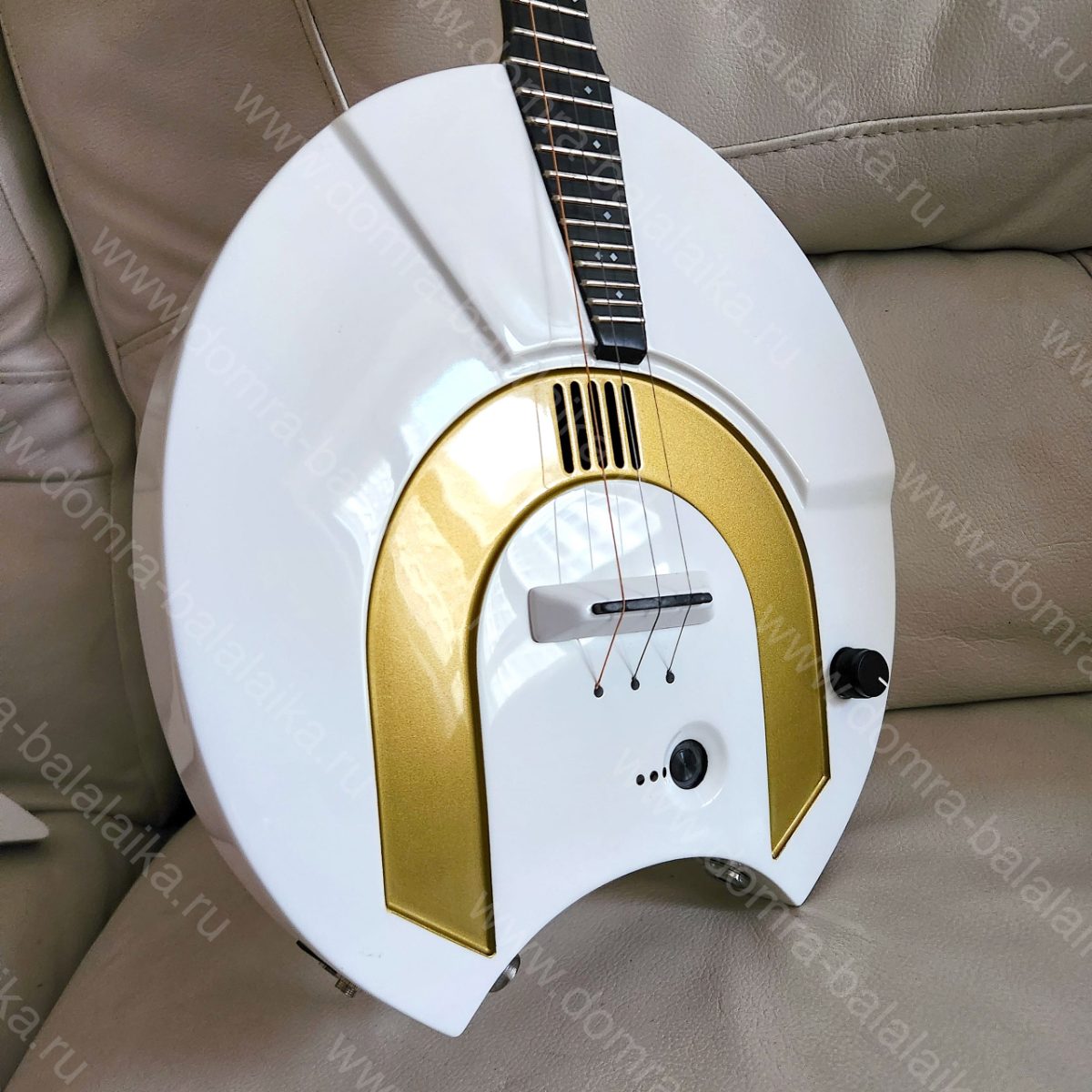 Yesterday, we shipped a white‑and‑gold electric domra and a white‑and‑gold elec..., photo 1
