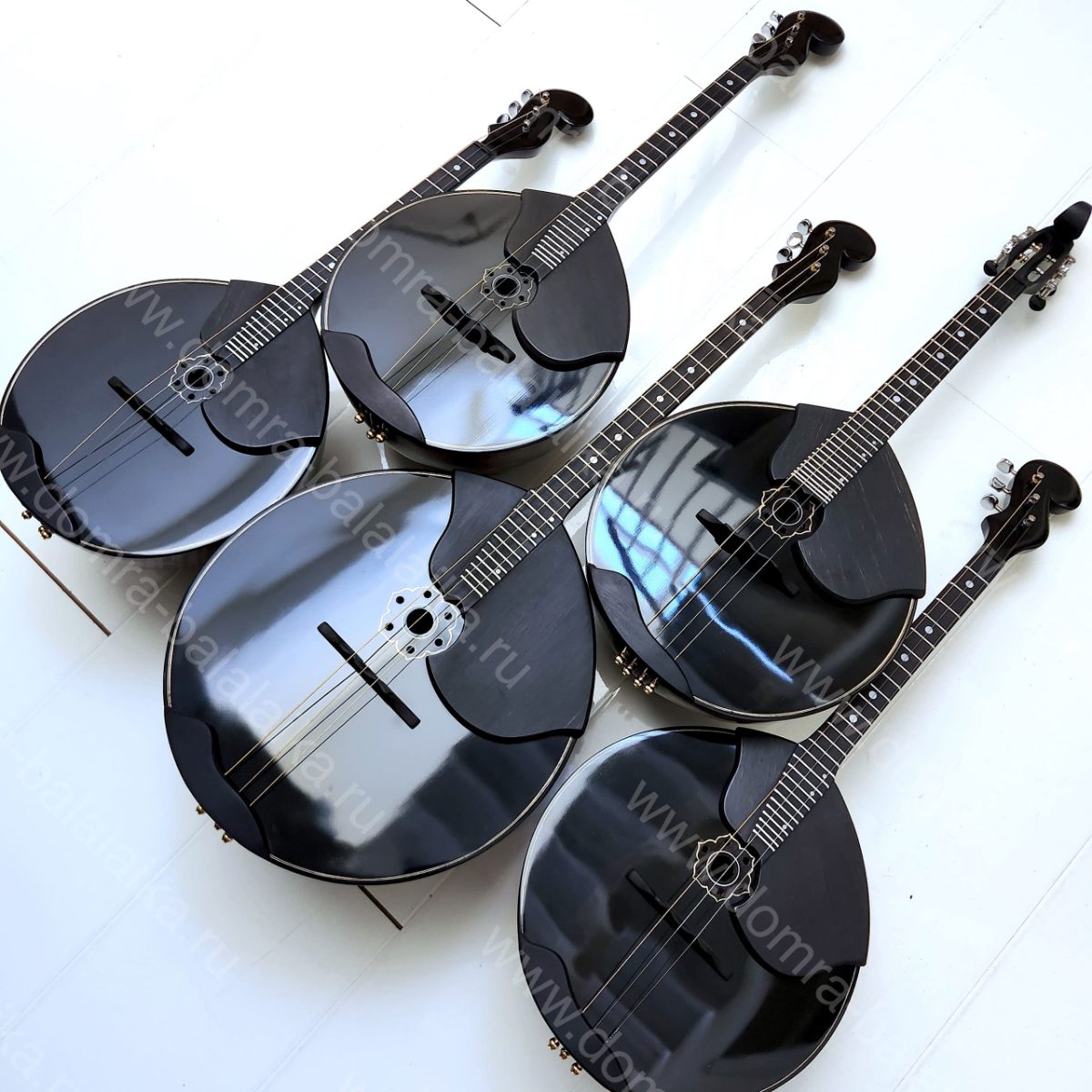 All the instruments feature a black-coloured, oversized figured maple body, an..., photo 1