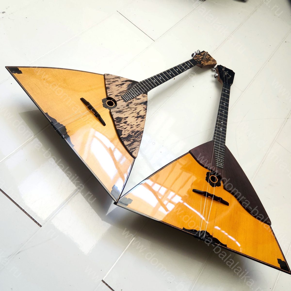 Today we have a couple of balalaikas. The body is made of figured maple, the so..., photo 5