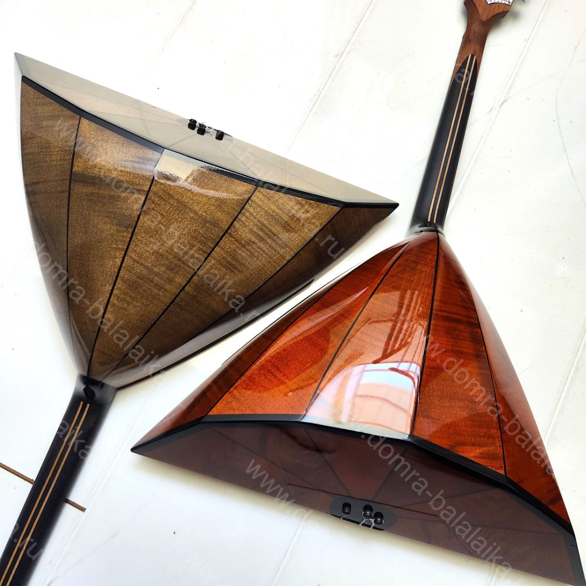 Today we have a couple of balalaikas. The body is made of figured maple, the so..., photo 6