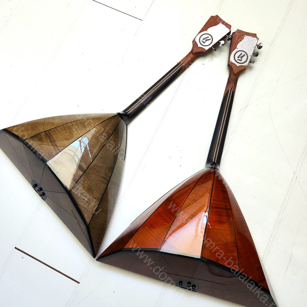 Today we have a couple of balalaikas. The body is made of figured maple, the so..., photo 3