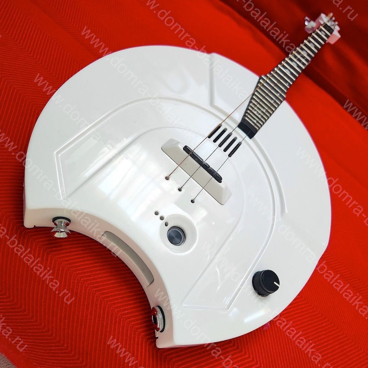 We crafted an all-white electric domra for one of our customers. It features a..., photo 2