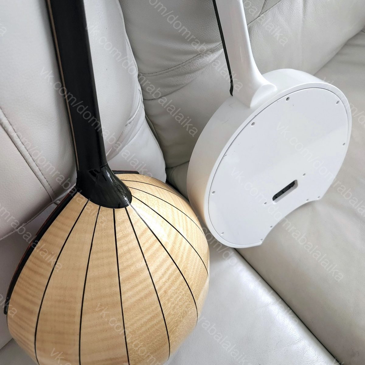 Here’s another striking pair — the coral “luxury” domra and the white‑and‑gold..., photo 1