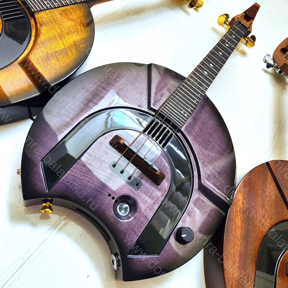 We have three four‑string electric prima domras ready! The one on the left is c..., photo 1